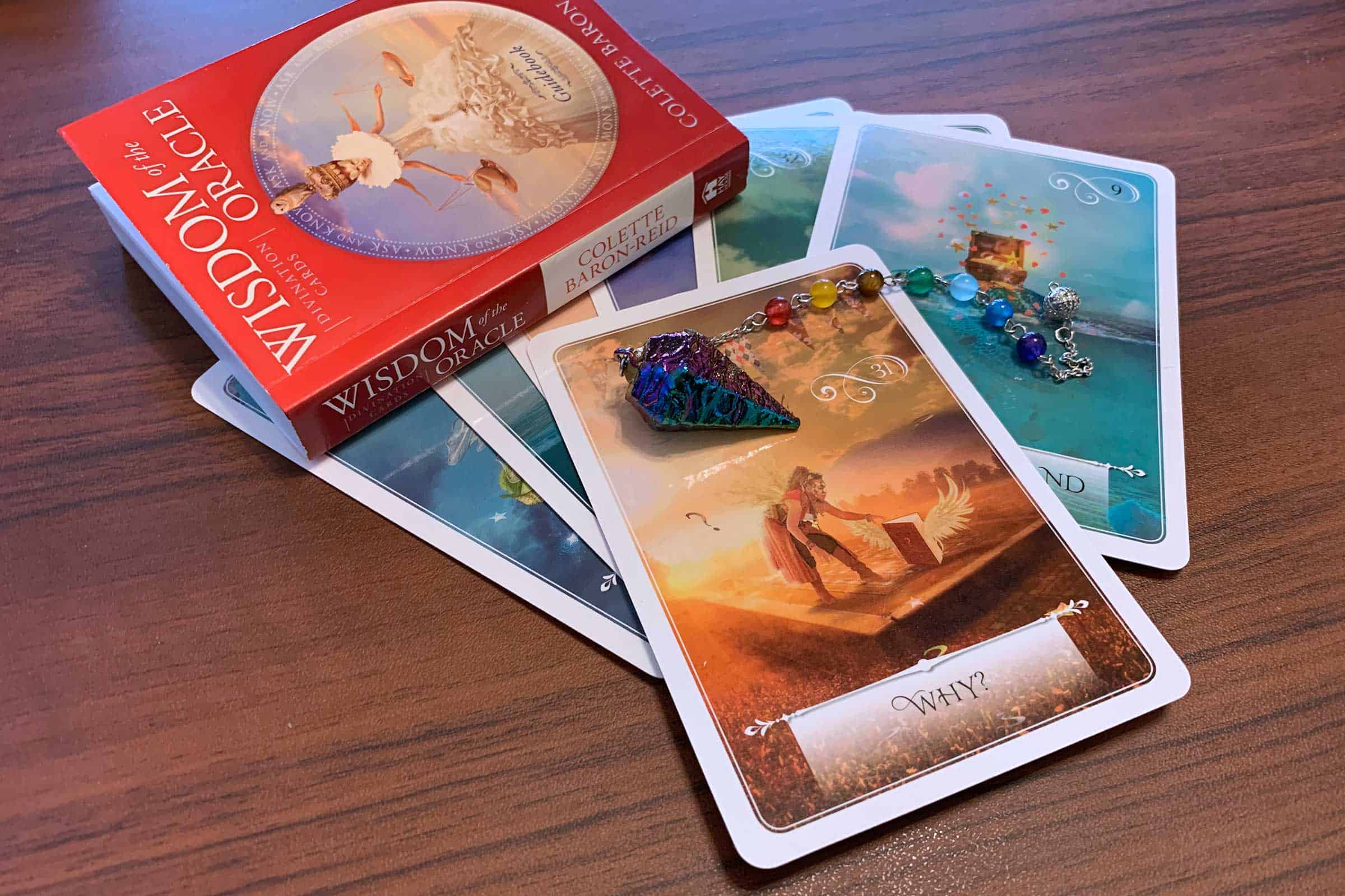 How your why impacts your coaching business brand. (Shown: Wisdom of the Oracle deck by Colette Baron-Reid)